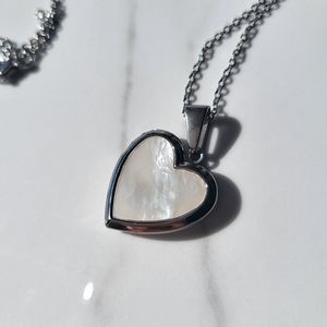 Stainless steel silver heart locket with sea shell front necklace